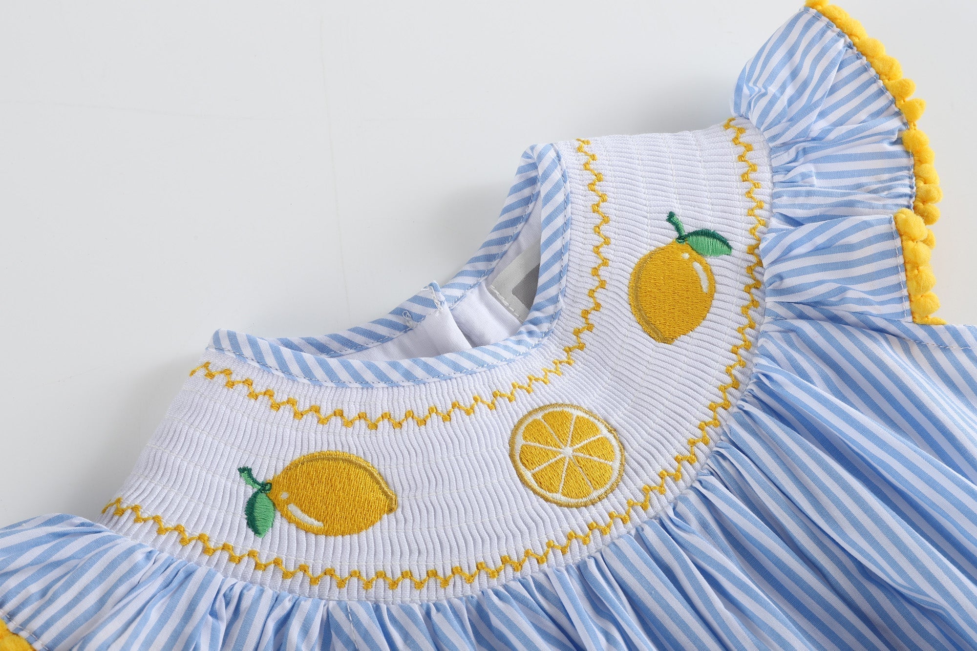 Light Blue Striped Lemons Smocked Ruffle Romper